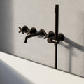 Axiom Wall Mounted Bath Mixer with Hand Shower